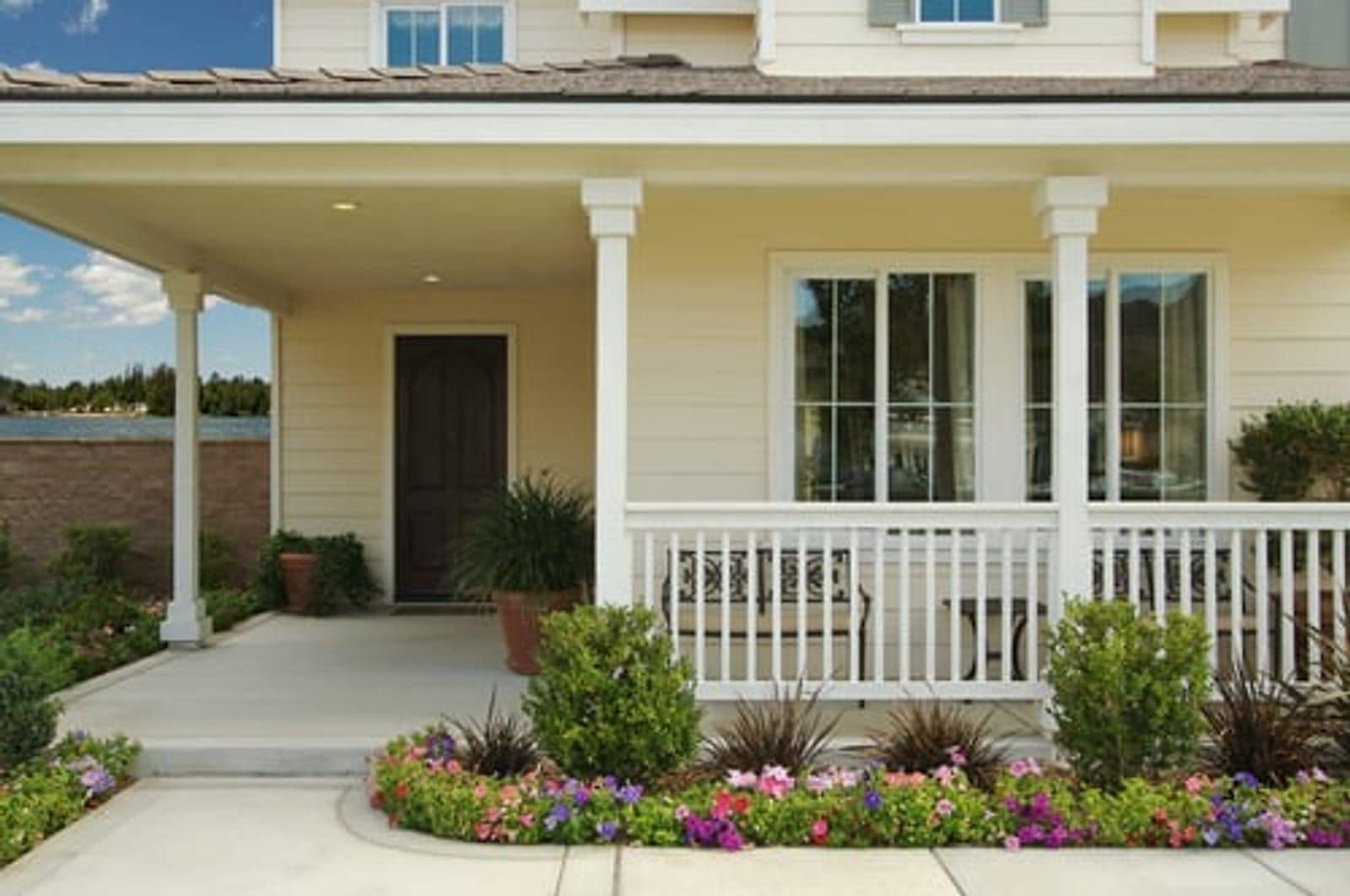 Craftsman-style home with newly installed lap siding and a covered front porch in Wichita, Kansas